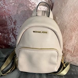 small MK blush pink backpack purse. brand new never used.